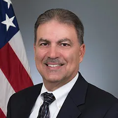 Mike E. White, SES